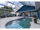 Enclosed pool area with fountain feature, lounge seating, and covered patio at 11619 Lane Park Rd, Tavares, FL 32778