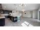 Bright and spacious kitchen that opens to a large living area, modern appliances and decor at 118 Green Branch Blvd, Groveland, FL 34736