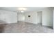 Spacious and bright living room with tile flooring and neutral paint, a blank canvas at 118 Green Branch Blvd, Groveland, FL 34736