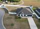 Expansive fenced yard with a well-maintained single-story home, offering privacy and ample outdoor space at 12807 Sugar Ct, Grand Island, FL 32735