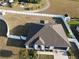 Aerial view of home featuring fenced yard, and mature landscaping at 12807 Sugar Ct, Grand Island, FL 32735