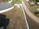 Aerial view of the expansive backyard showing the privacy fence at 12807 Sugar Ct, Grand Island, FL 32735