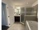 Bright bathroom boasts a soaking tub and walk-in shower at 12807 Sugar Ct, Grand Island, FL 32735