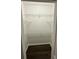 Well-organized pantry with multiple wire shelves and sleek dark wood flooring providing ample storage space at 12807 Sugar Ct, Grand Island, FL 32735
