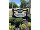 Sugar Hill Estates community sign surrounded by decorative landscaping in a suburban neighborhood at 12807 Sugar Ct, Grand Island, FL 32735