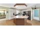 View of the kitchen featuring an island and stainless steel appliances at 1310 Leone Ln, The Villages, FL 32159