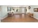 Inviting living room with tile flooring, a ceiling fan, and a serene, comfortable atmosphere at 1310 Leone Ln, The Villages, FL 32159