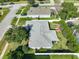 Birds-eye-view of the home, showing landscaping, nearby streets, and surrounding neighborhood at 1407 Island Cove Dr, Deland, FL 32724