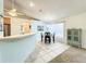 Bright dining area with tile flooring, modern lighting fixture and view to kitchen area at 1407 Island Cove Dr, Deland, FL 32724