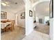 Hallway that shows entrances to dining room, living room, and front door at 1407 Island Cove Dr, Deland, FL 32724