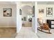 Bright hallway with tile flooring, archways, and a glimpse of the living room at 1407 Island Cove Dr, Deland, FL 32724