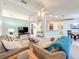 Open concept area that seamlessly blends living, dining and kitchen areas at 1407 Island Cove Dr, Deland, FL 32724