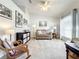Comfortable living room with neutral carpet, vaulted ceiling, and lots of natural light at 1407 Island Cove Dr, Deland, FL 32724