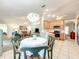 Open floor plan featuring a dining area, kitchen and living room at 1407 Island Cove Dr, Deland, FL 32724