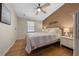 Bedroom featuring a neutral color scheme, ceiling fan and lots of natural light at 1541 Doral Cir, Lady Lake, FL 32159