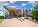 Spacious carport and walkway of this home, perfect for enjoying the outdoors and parking at 1541 Doral Cir, Lady Lake, FL 32159