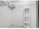 Walk-in closet with shelving, ample space for organized storage, and ensuring a clutter-free lifestyle at 1541 Doral Cir, Lady Lake, FL 32159