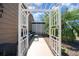 Inviting outdoor seating area that leads to the house's entrance at 1541 Doral Cir, Lady Lake, FL 32159