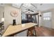 Open kitchen with stainless steel appliances, adjacent breakfast bar, and eat in dining area at 1541 Doral Cir, Lady Lake, FL 32159