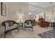 Inviting seating area showcasing a cozy arrangement with elegant decor at 1541 Doral Cir, Lady Lake, FL 32159