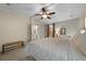 The main bedroom has a vaulted ceiling and en-suite bath at 1541 Doral Cir, Lady Lake, FL 32159