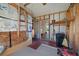 Shed interior with ample storage, shelving, and exterior access at 1541 Doral Cir, Lady Lake, FL 32159