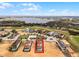 Aerial view of a home near a lake at 16028 Trivoli Cir, Montverde, FL 34756