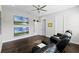 Comfortable living room featuring hardwood floors, recessed lighting, and stylish decor at 16028 Trivoli Cir, Montverde, FL 34756