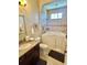 A bathroom with a seated tub, tiled floors, and granite countertops at 17066 Se 111Th Ter, Summerfield, FL 34491