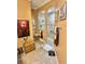 Bathroom featuring tile flooring and a tiled walk-in shower at 17066 Se 111Th Ter, Summerfield, FL 34491