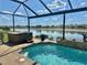 Enjoy the Florida sunshine from this screened lanai with beautiful pool and relaxing spa at 17066 Se 111Th Ter, Summerfield, FL 34491