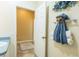 Well-lit bathroom showcasing an open door to the adjacent bathroom at 1723 Morelos Rd, The Villages, FL 32159