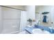 Well-maintained bathroom featuring essential fixtures and a decorative flower for a touch of elegance at 1723 Morelos Rd, The Villages, FL 32159