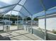 Spacious patio with clear views of the community, ideal for relaxation and enjoying the outdoors at 1723 Morelos Rd, The Villages, FL 32159