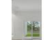 Bright living room with sliding glass doors to the backyard at 179 Bottle Brush Dr, Haines City, FL 33844