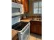 Bright kitchen with modern appliances, ample cabinet space, and natural light at 201 Jacaranda Dr, Leesburg, FL 34748