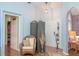 Foyer features a tile floor with a view into the living room at 202 N Palm Ave, Howey In The Hills, FL 34737