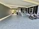 Home exterior showcasing a spacious carport area and inviting front entrance at 207 Hawthorne Blvd, Leesburg, FL 34748