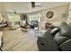 Bright living room with comfortable seating, natural light, and modern decor at 207 Hawthorne Blvd, Leesburg, FL 34748