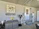Cozy sunroom featuring comfortable seating and inviting decor at 207 Hawthorne Blvd, Leesburg, FL 34748