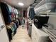 Walk-in closet with clothing racks and shelves, with a safe and chest of drawers for maximum storage at 207 Hawthorne Blvd, Leesburg, FL 34748