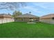 Spacious backyard with a privacy fence, perfect for outdoor entertaining and relaxation at 20816 Sullivan Ranch Blvd, Mount Dora, FL 32757