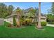Large, fenced backyard with lush green grass, providing ample space for outdoor activities at 20816 Sullivan Ranch Blvd, Mount Dora, FL 32757
