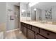 Bathroom featuring a double vanity, tile floors and neutral paint at 20816 Sullivan Ranch Blvd, Mount Dora, FL 32757