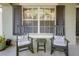 Inviting front porch with rocking chairs, perfect for relaxing and enjoying the outdoors at 20816 Sullivan Ranch Blvd, Mount Dora, FL 32757