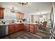 Beautiful kitchen features granite countertops, stainless steel appliances, and a breakfast nook with a view at 2142 Margarita Dr, The Villages, FL 32159