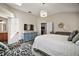 Spacious main bedroom with walk-in closets and views of the ensuite bathroom at 2142 Margarita Dr, The Villages, FL 32159