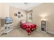 bedroom featuring Mickey Mouse-themed bedding, a TV, and a window view at 23814 Sardinia Dr, Sorrento, FL 32776