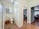 Bathroom featuring a glass enclosed shower, tiled floors, and a doorway to the bedroom at 25545 Laurel Valley Rd, Leesburg, FL 34748