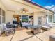 Open-air patio featuring tile flooring, comfortable seating, and access to the home's interior at 25545 Laurel Valley Rd, Leesburg, FL 34748